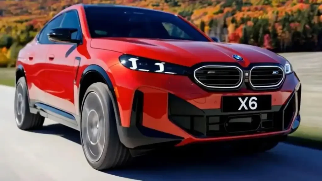 Front view of the 2026 BMW X6 in red with updated laser headlights and sporty design