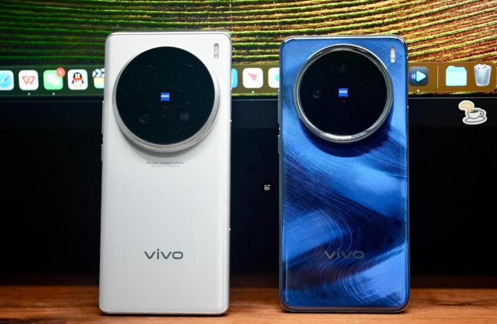 Rear view of vivo X300 smartphones in white and blue variants showcasing the large circular Zeiss camera module