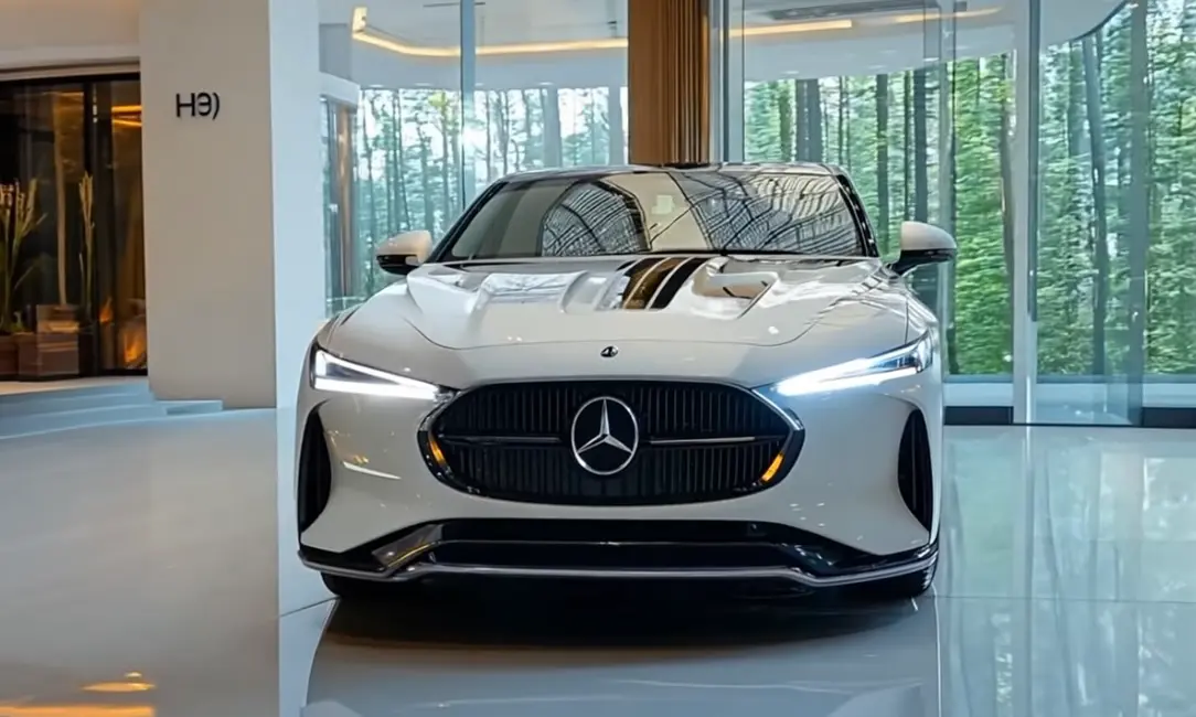 Front view of the 2026 Mercedes-Benz C-Class luxury sedan showcasing its bold grille, sleek LED headlights, and futuristic design