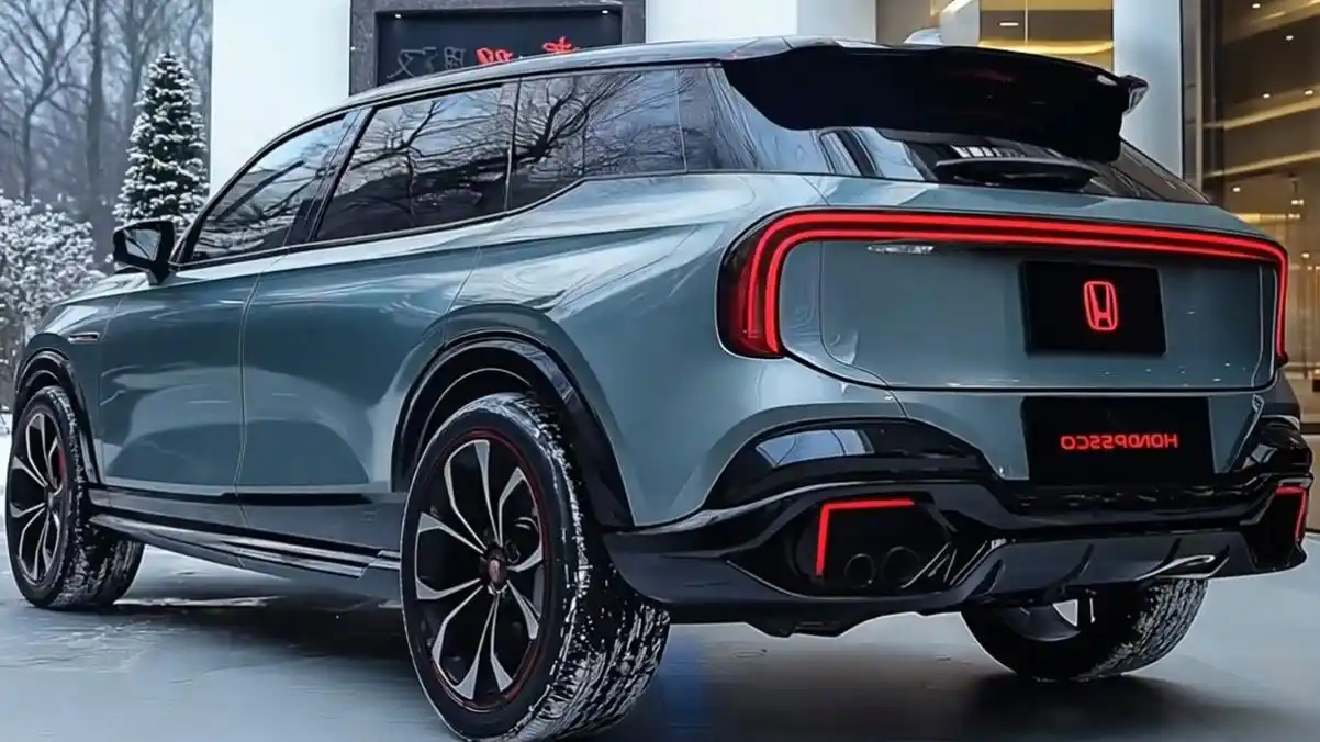 Rear view of the Honda Passport showcasing bold LED tail lights, sporty alloy wheels, dual exhausts, and a sleek modern design in a winter setting