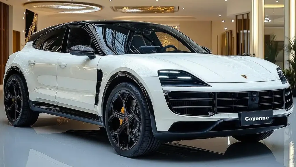 White 2026 Porsche Cayenne SUV showcased indoors with black accents