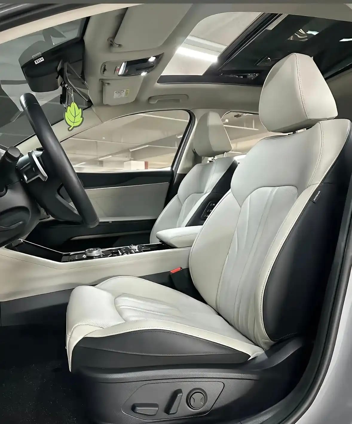 Front seats of Kia K5 with sunroof