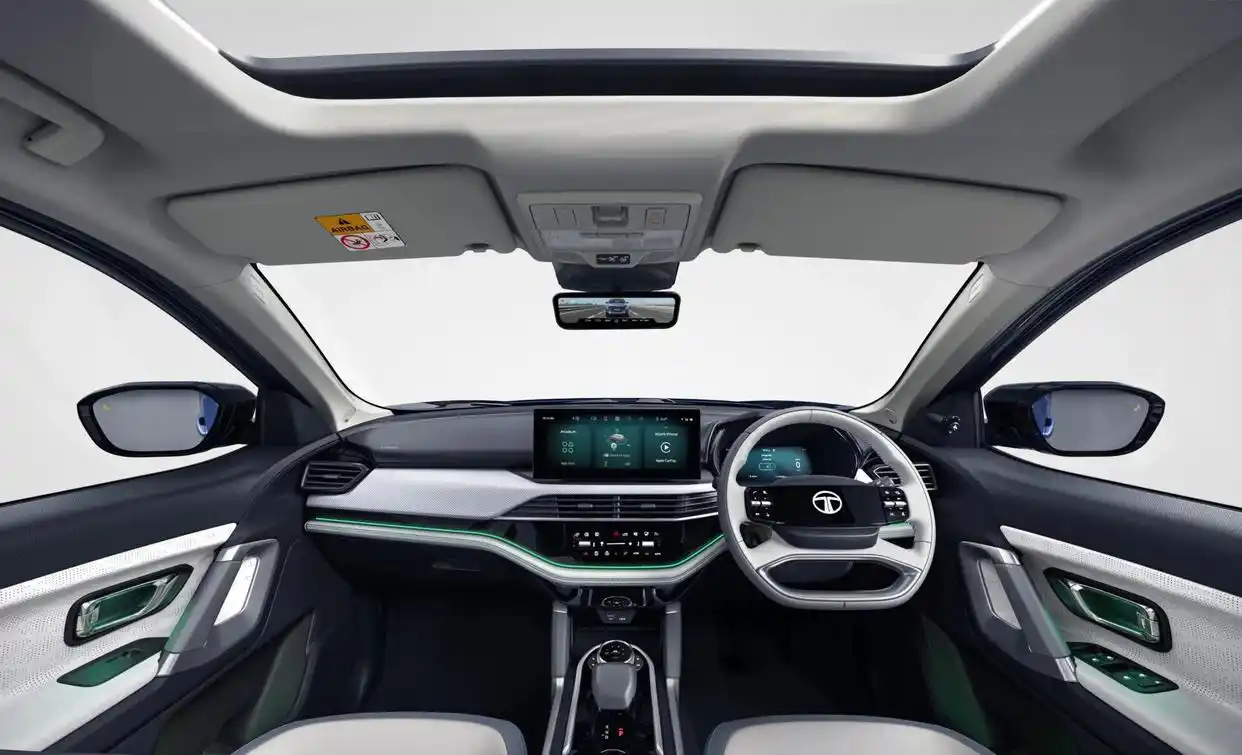Tata Harrier EV dashboard with panoramic sunroof view