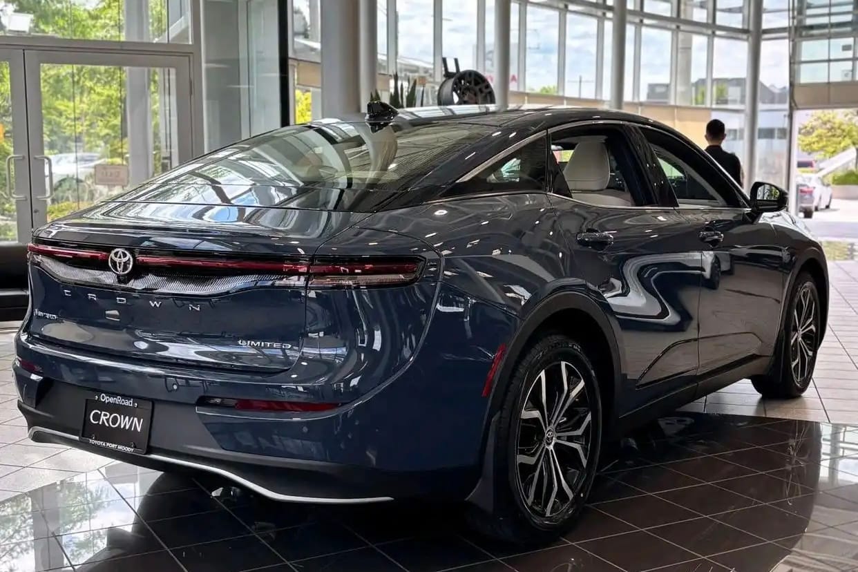 Rear view of Toyota Crown Limited in showroom