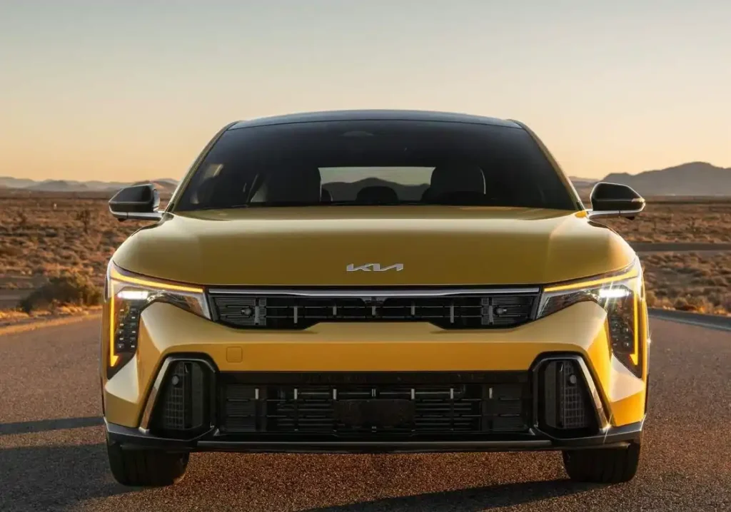 Yellow 2026 Kia K4 hatchback front view