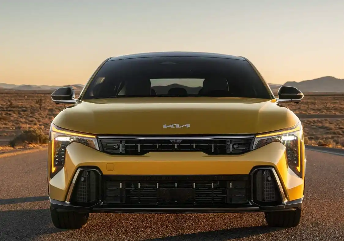 Yellow 2026 Kia K4 hatchback front view
