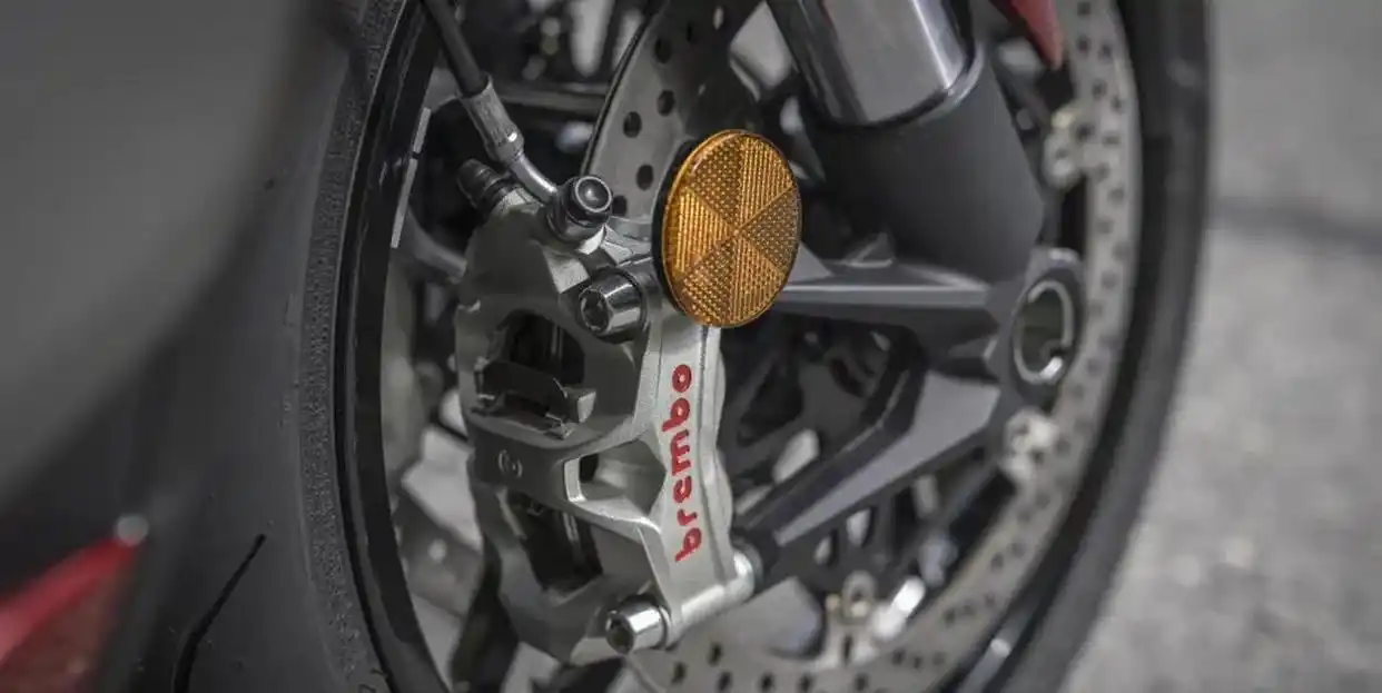 Brembo calipers and tire on a Ducati motorcycle