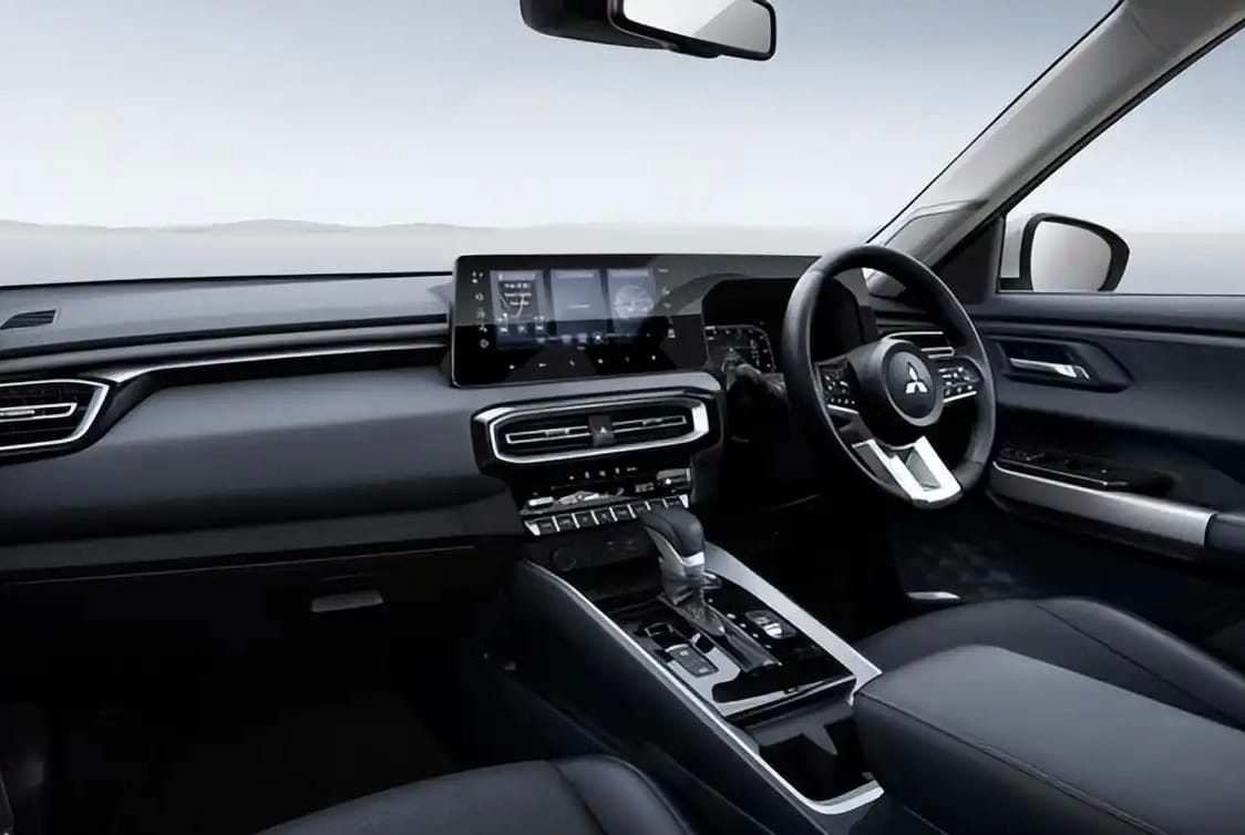 Interior view of the Mitsubishi Destinator's dashboard and infotainment system