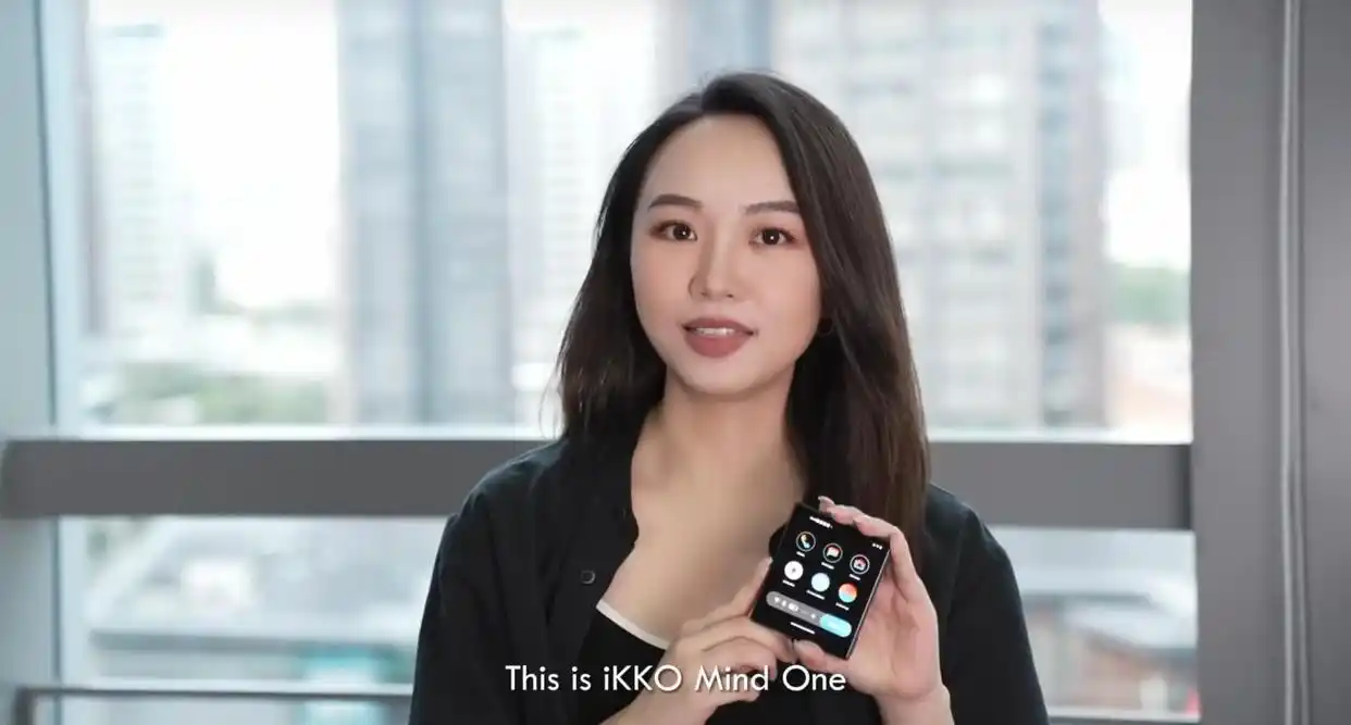 Woman holding iKKO Mind One phone