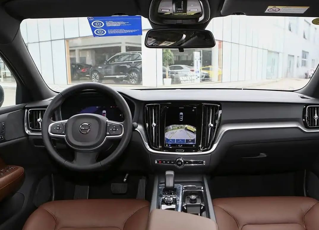 Premium Volvo S60 dashboard with touchscreen and leather seats