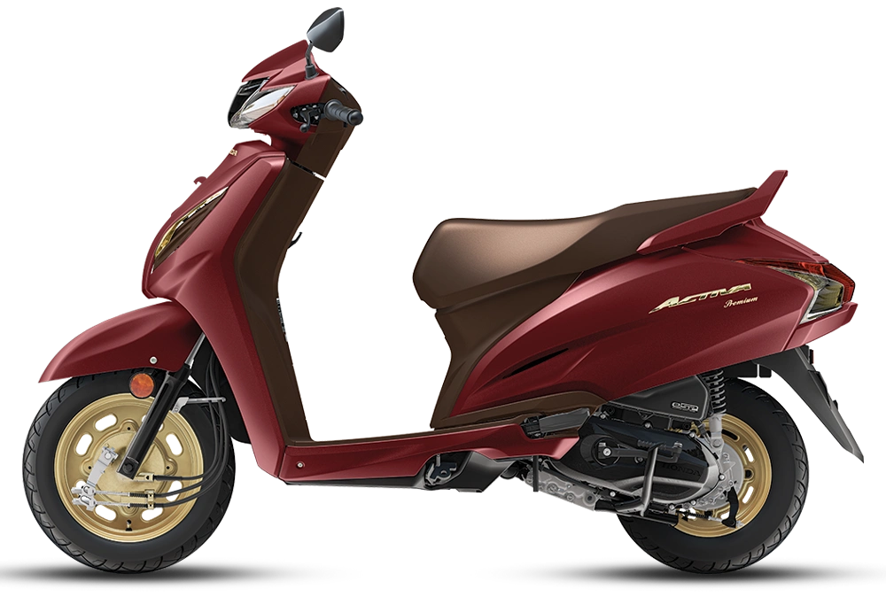 Side view of red Honda Activa Premium edition scooter