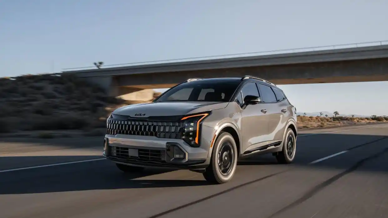 2025 Kia Sportage driving fast on open highway