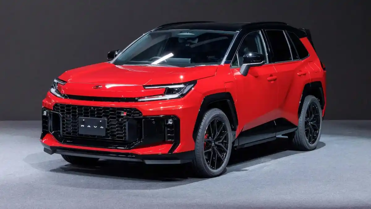 2025 Toyota RAV4 GR Sport edition in striking red with sporty blacked-out accents and alloy wheels
