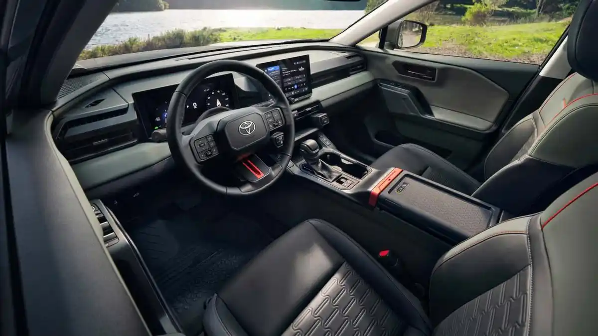 2025 Toyota RAV4 interior featuring modern dashboard, touchscreen display, and premium leather seats