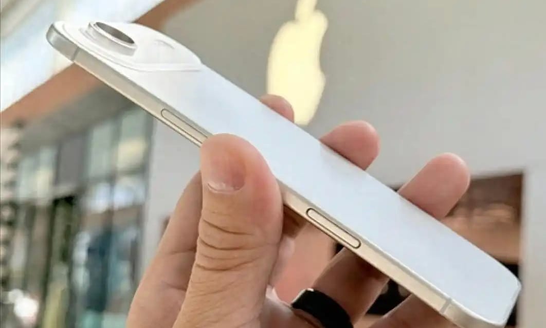 Person holding slim iPhone 17 air phone price