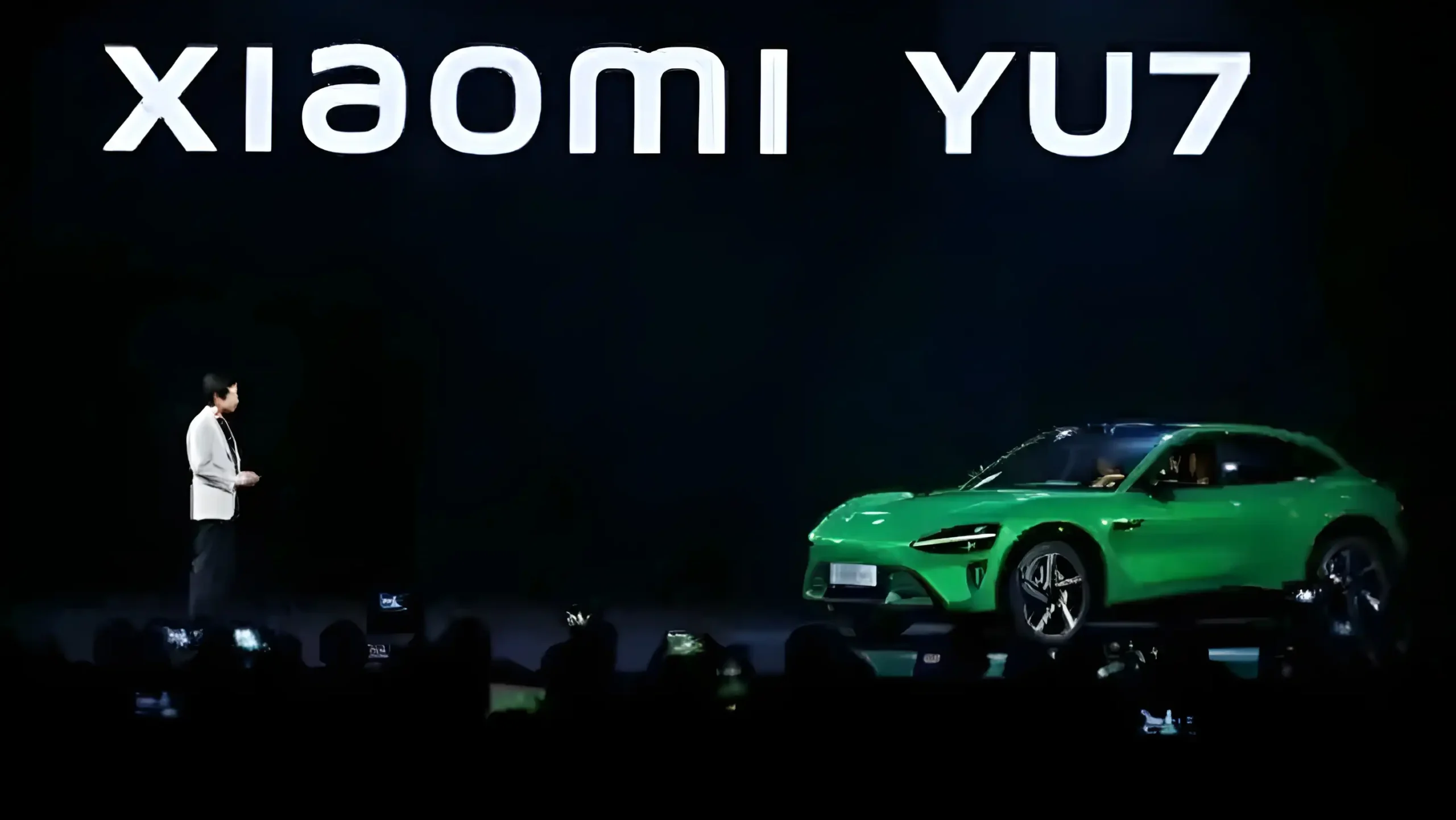 Lei Jun introducing the new Xiaomi YU7 electric SUV on stage