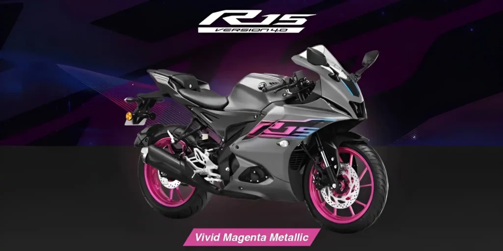 A gray and magenta Yamaha R15 Version 4.0 motorcycle with bright pink wheels and R15 logo.