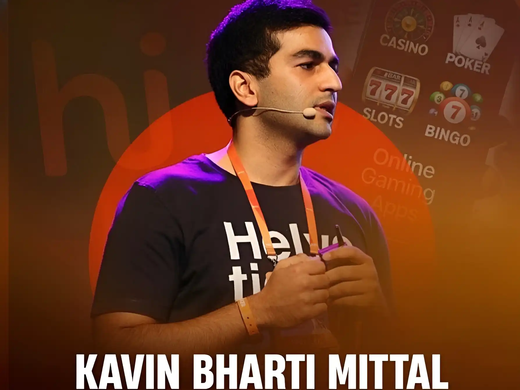 Kavin Bharti Mittal speaking on stage with microphone and presentation background