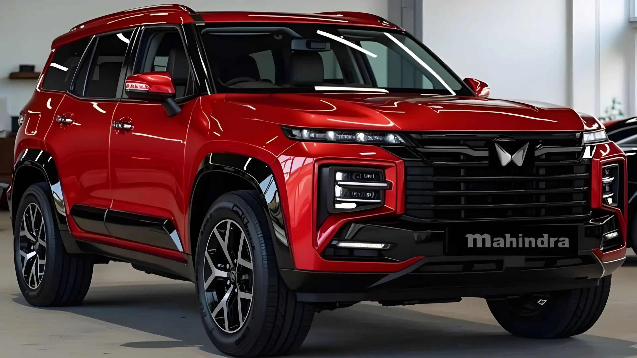 Mahindra Scorpio N  2025 in striking red with bold design and modern LED headlights showcased indoors