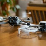 DJI Mini 5 Pro drone with 50MP camera and compact design displayed on a wooden table