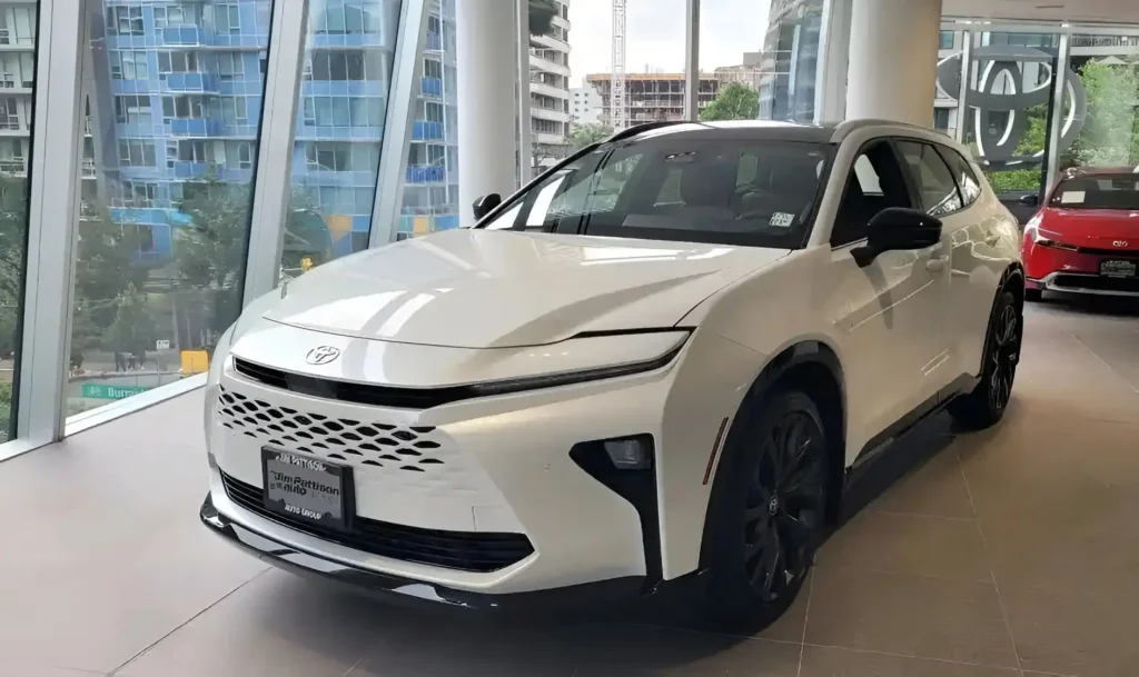 New generation Toyota Crown SUV in white showcased at dealership with modern design