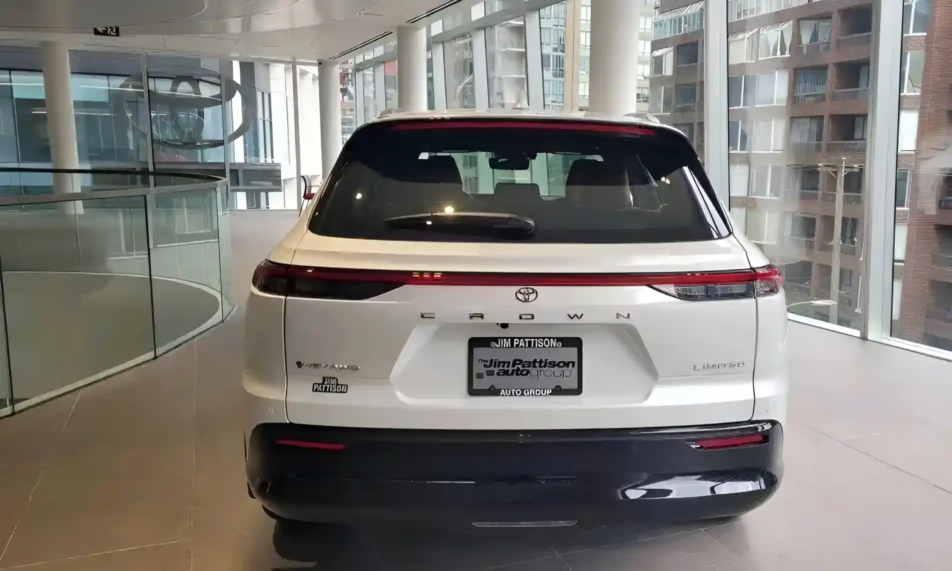 Back view of new generation Toyota Crown SUV in white with sleek modern design